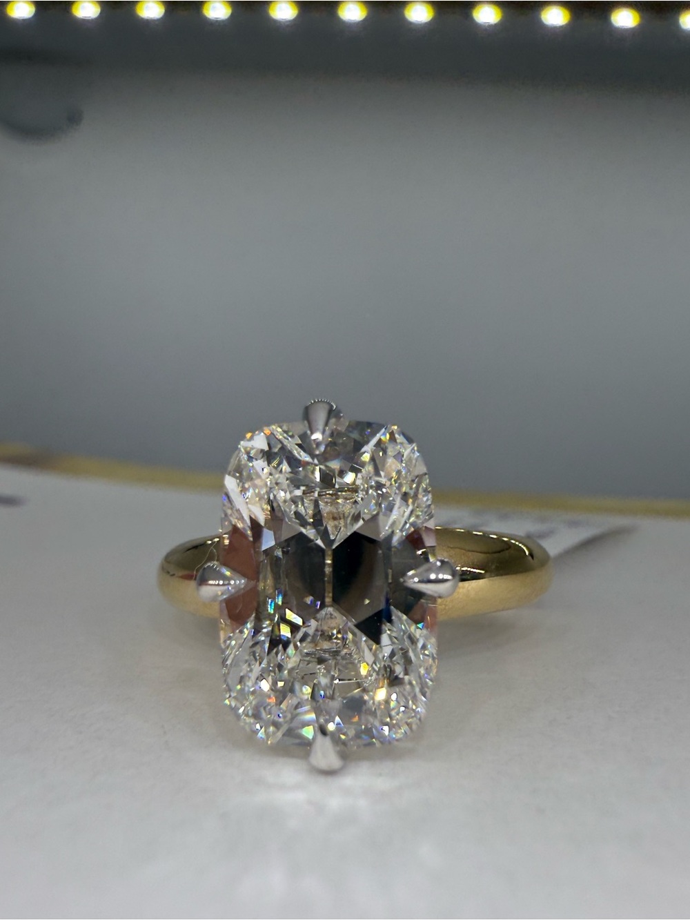 4.05 carat E VVS2 antique cushion lab diamond two toned engagement ring